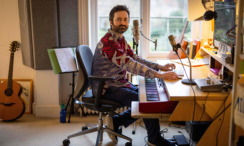 Musician and user of the video-focused social networking service TikTok Tom†Rosenthal, composes in his studio at his house, in London. — AFP