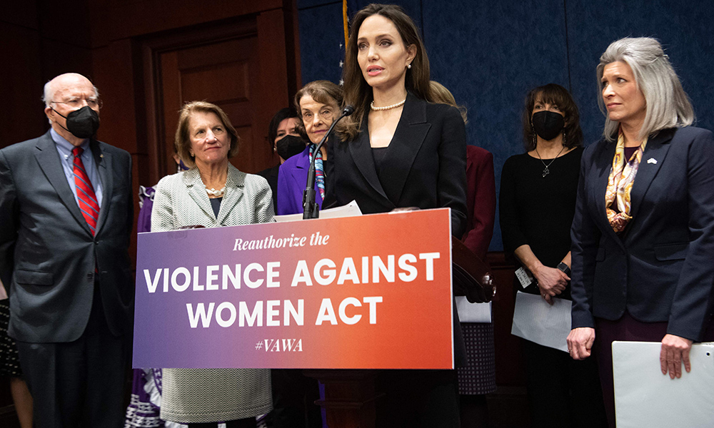 Actress Angelina Jolie (center), speaks alongside US Senator Joni Ernst (R-IA)  (right), US Senator Patrick Leahy (D-VT) (left), US Senator Shelley Moore Capito (R-WV) (second left), and US Senator Dianne Feinstein (D-CA) (third left), as they announce a bipartisan modernized Violence Against Women Act (VAWA), during a press conference on Capitol Hill in Washington, DC. — AFP