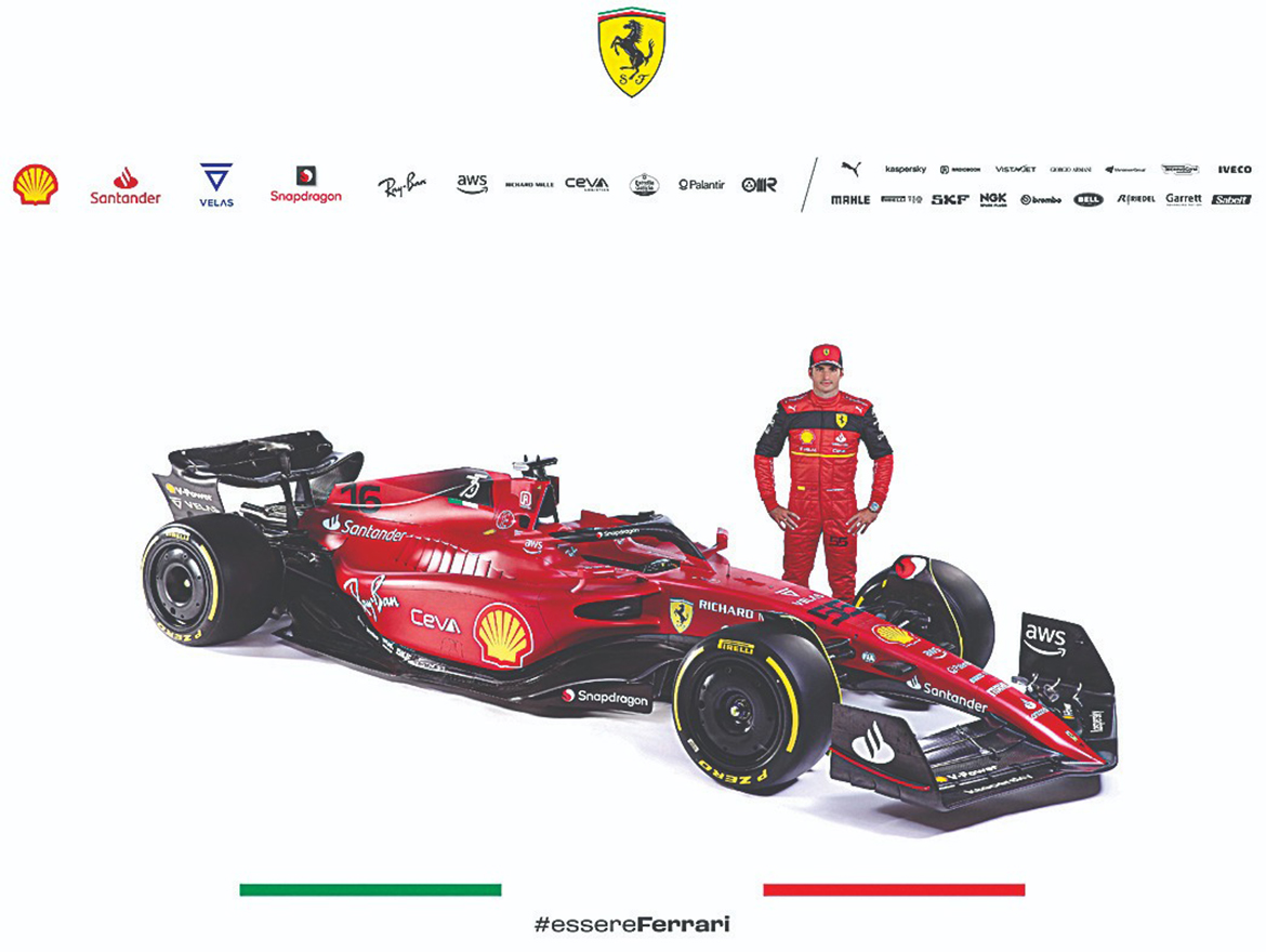 MARANELLO: This handout picture released by Ferrari press office yesterday shows Ferrari's driver Carlos Sainz posing with the new Ferrari F1-75 following its online official presentation. – AFP