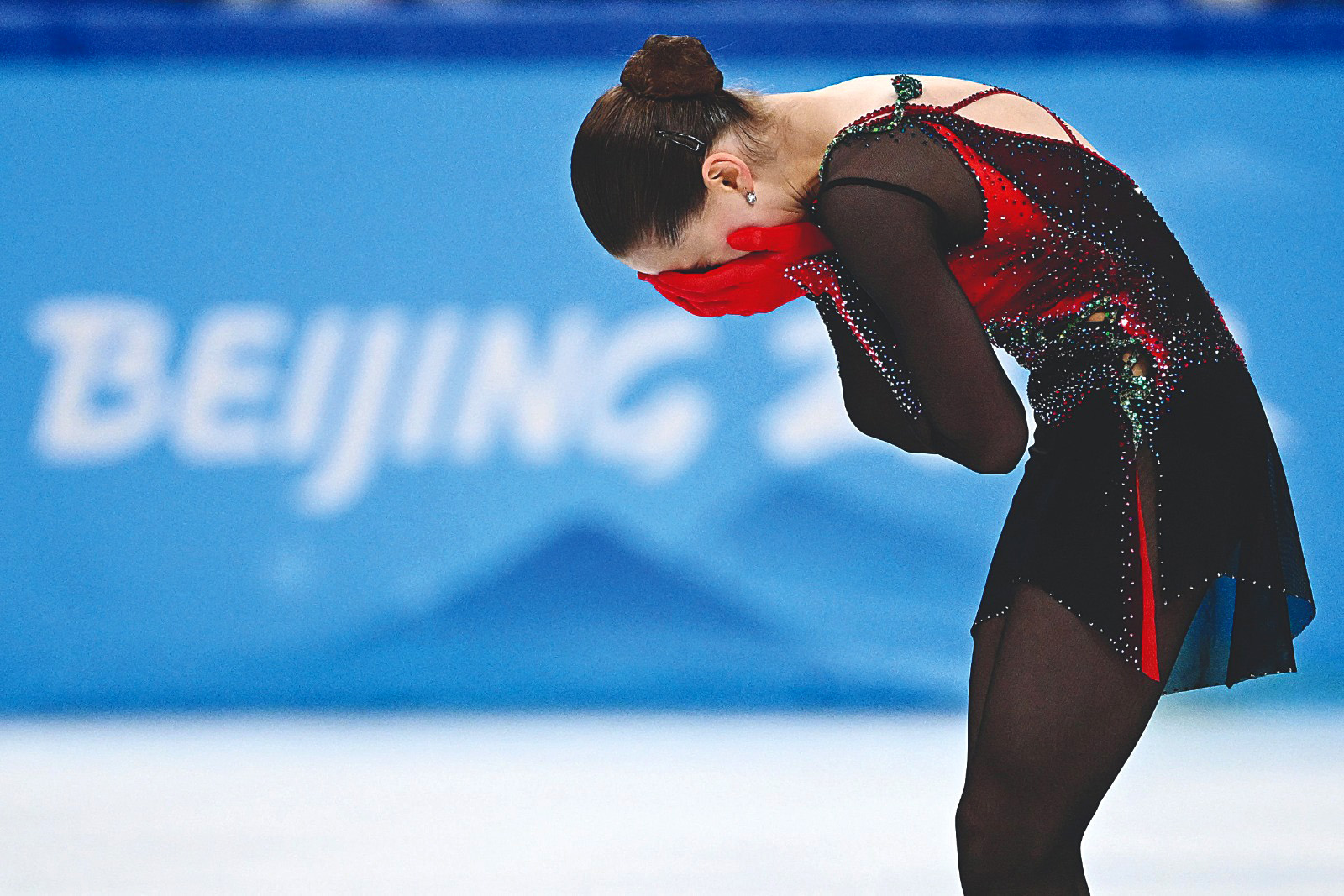BEIJING: Russia's Kamila Valieva reacts after competing in the women's single skating free skating of the figure skating event during the Beijing 2022 Winter Olympic Games at the Capital Indoor Stadium yesterday. - AFP