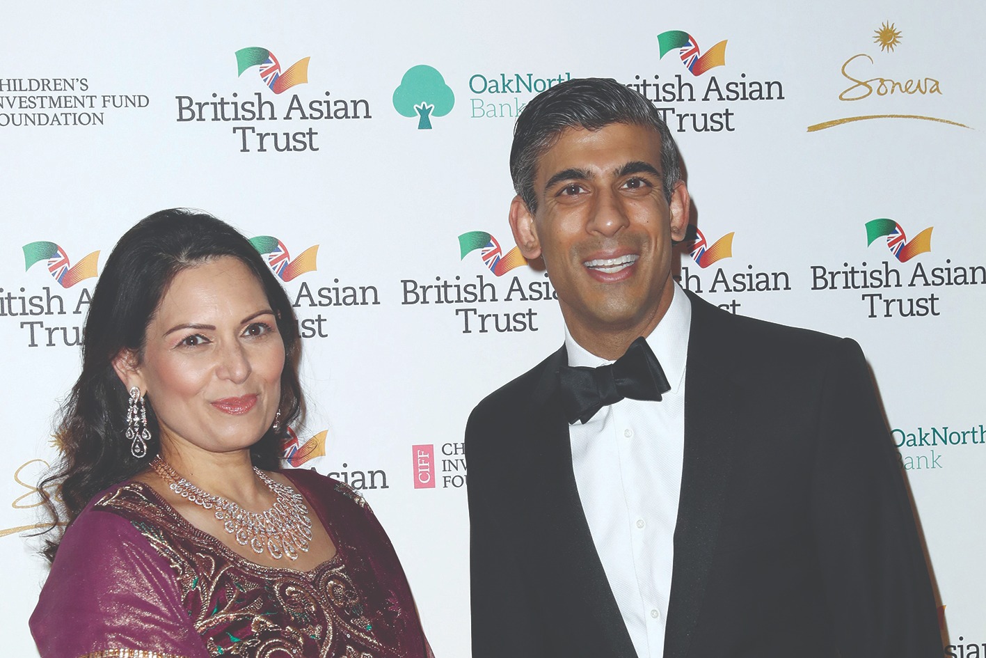 LONDON: Britain's Home Secretary Priti Patel (L) and Britain's Chancellor of the Exchequer Rishi Sunak pose for pictures during a reception to celebrate the British Asian Trust at The British Museum in London. - AFP