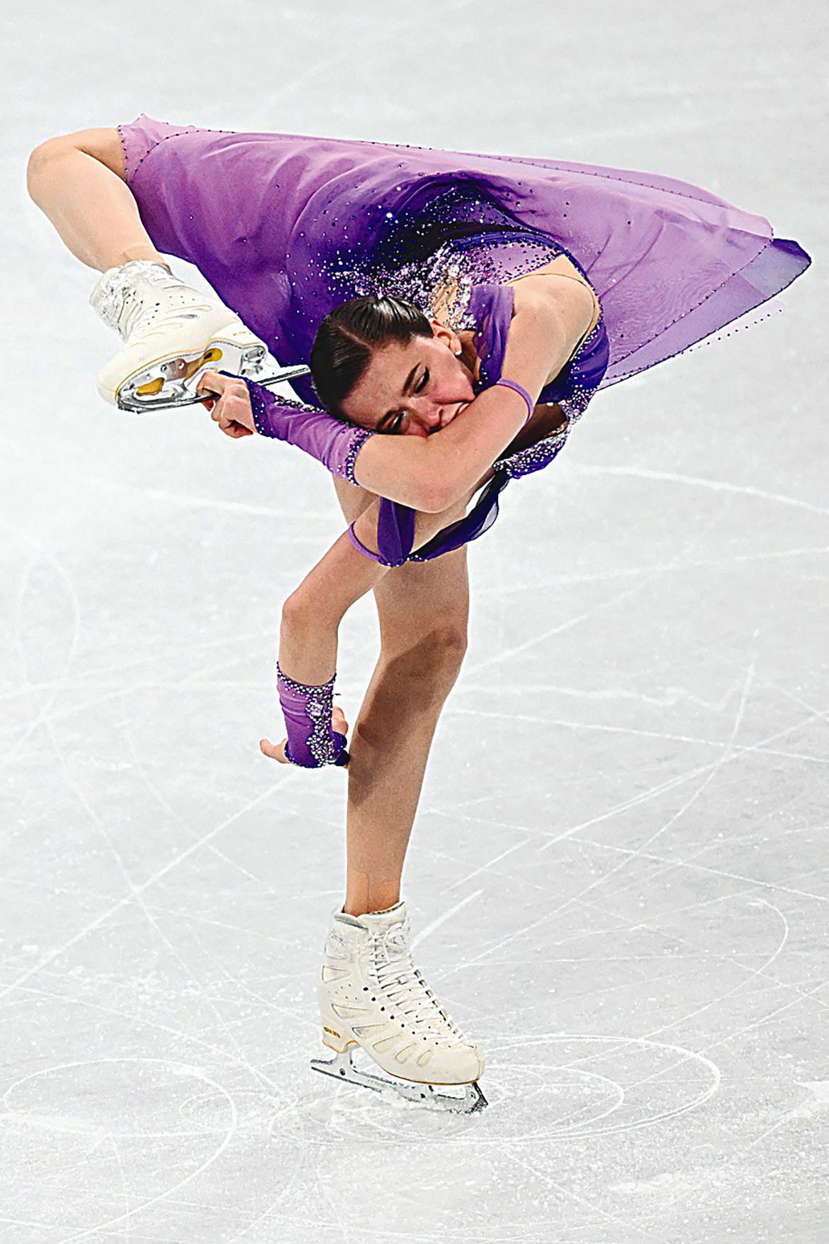 BEIJING: Russia's Kamila Valieva competes in the women's single skating short program of the figure skating event during the Beijing 2022 Winter Olympic Games yesterday. - AFP