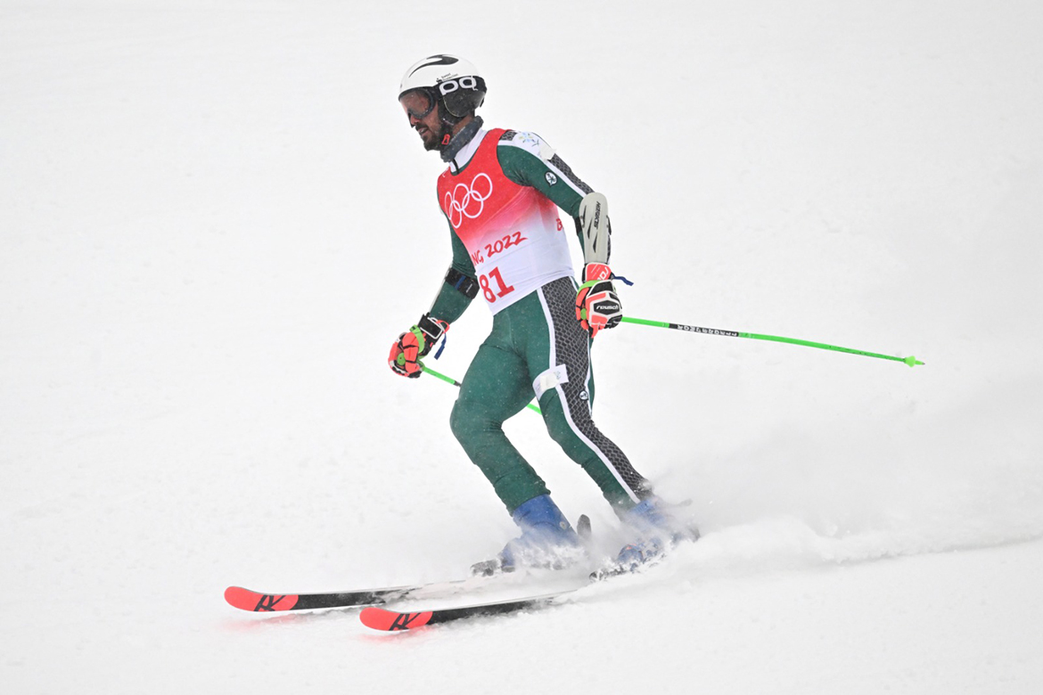 YANQING, China: Saudi Arabia's Fayik Abdi reacts after competing in the second run of the men's giant slalom during the Beijing 2022 Winter Olympic Games at the Yanqing National Alpine Skiing Centre yesterday. - AFP