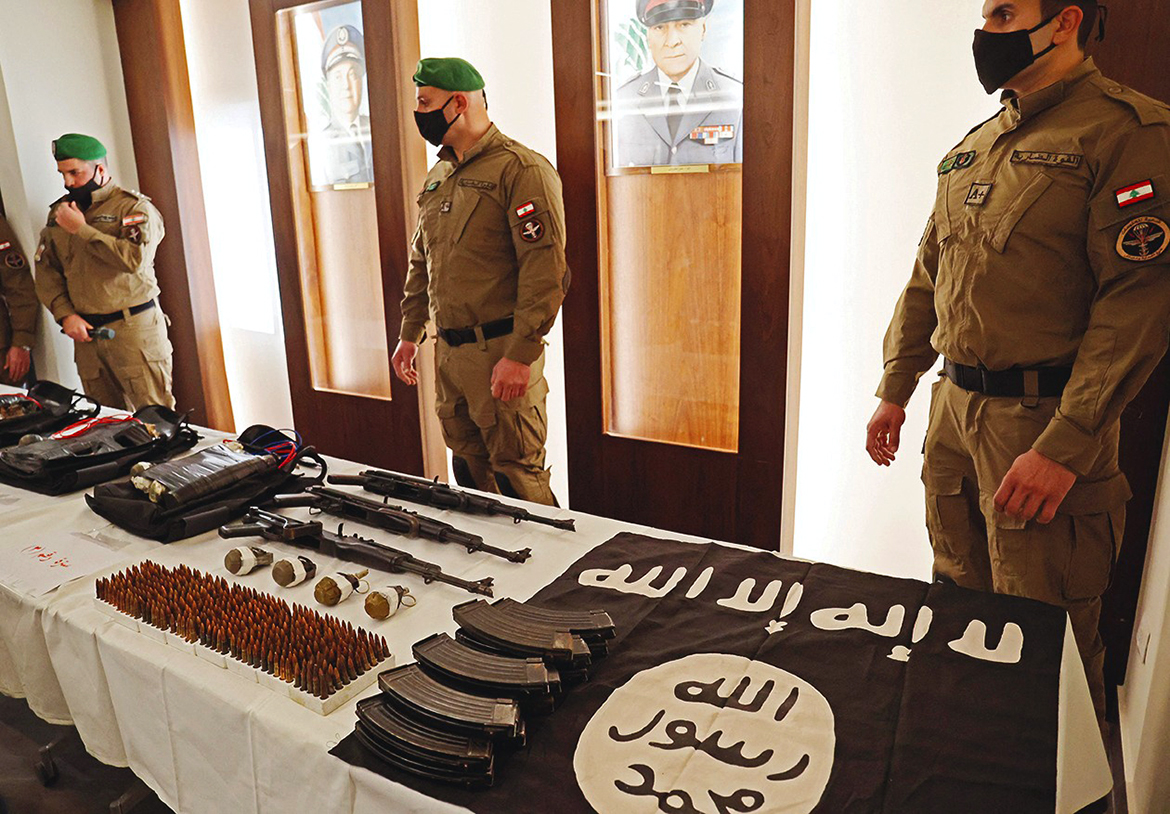 BEIRUT: Lebanese Internal Security Forces show weapons seized from the Islamic State group, which was planning attacks on targets in Beirut's southern suburbs, during a press conference yesterday. - AFP