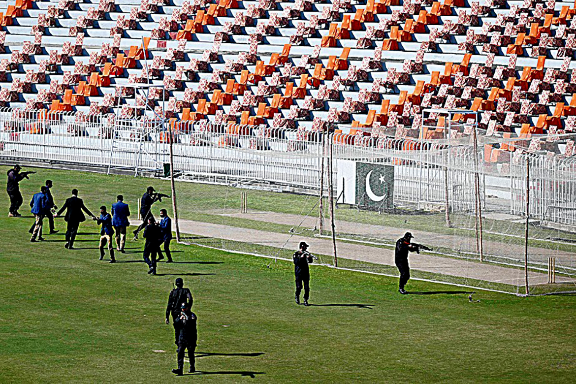 RAWALPINDI: Security personnel conduct a security drill at the Rawalpindi Cricket Stadium yesterday ahead of the first cricket Test match between Pakistan and Australia. - AFP