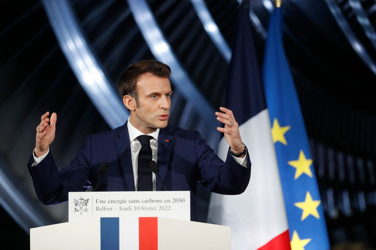 French President Emmanuel Macron delivers a speech at the GE Steam Power System main production site for its nuclear turbine systems in Belfort, eastern France. - AFP