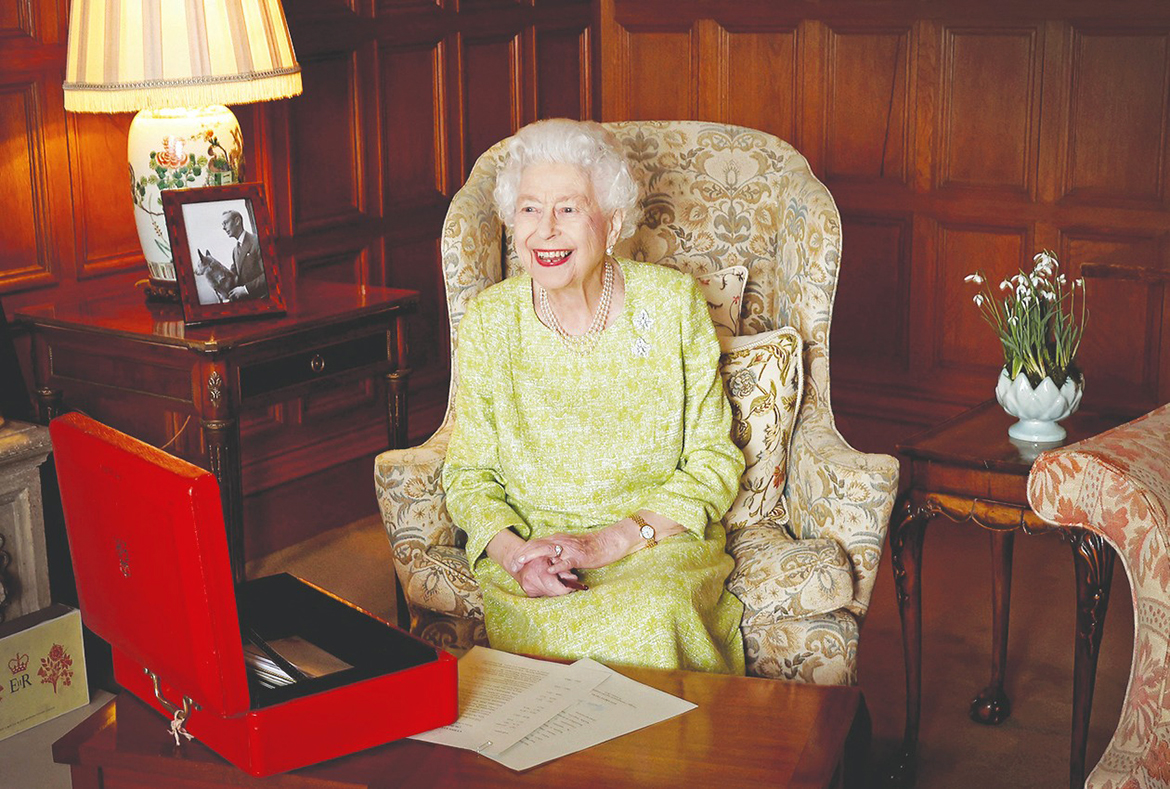 SANDRINGHAM: A Buckingham Palace handout image released yesterday shows Britain's Queen Elizabeth II smiling as she sits in Sandringham House on Feb 2, 2022, released to mark the start of her Platinum Jubilee Year. - AFP