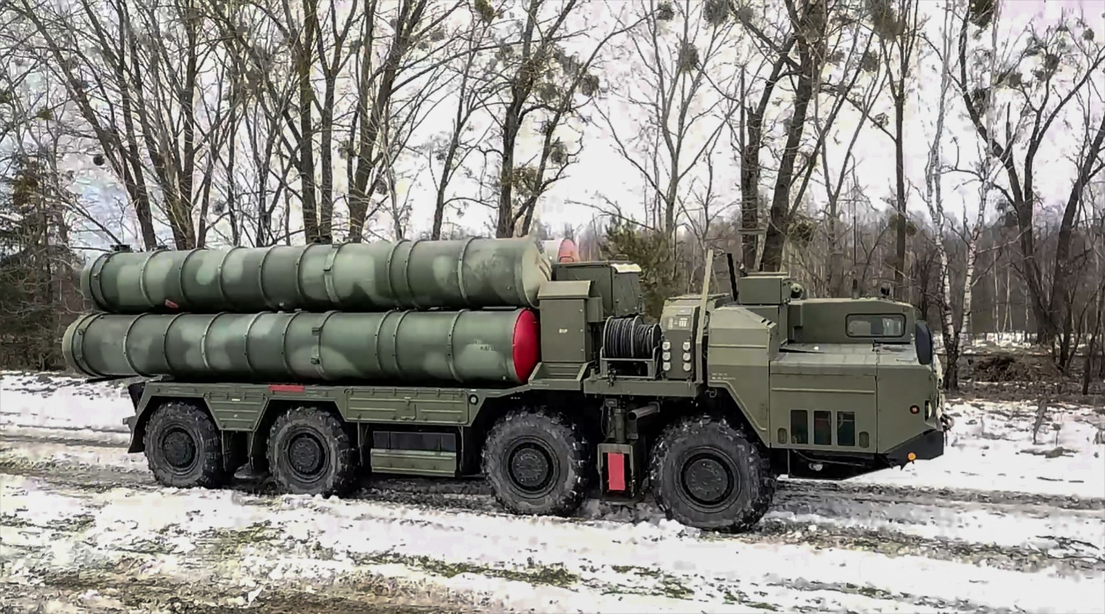 This handout video grab shows combat crews of the S-400 air defense system driving during joint exercises of the armed forces of Russia and Belarus as part of an inspection of the Union State’s Response Force, at a firing range in Brest region of Belarus. - AFP