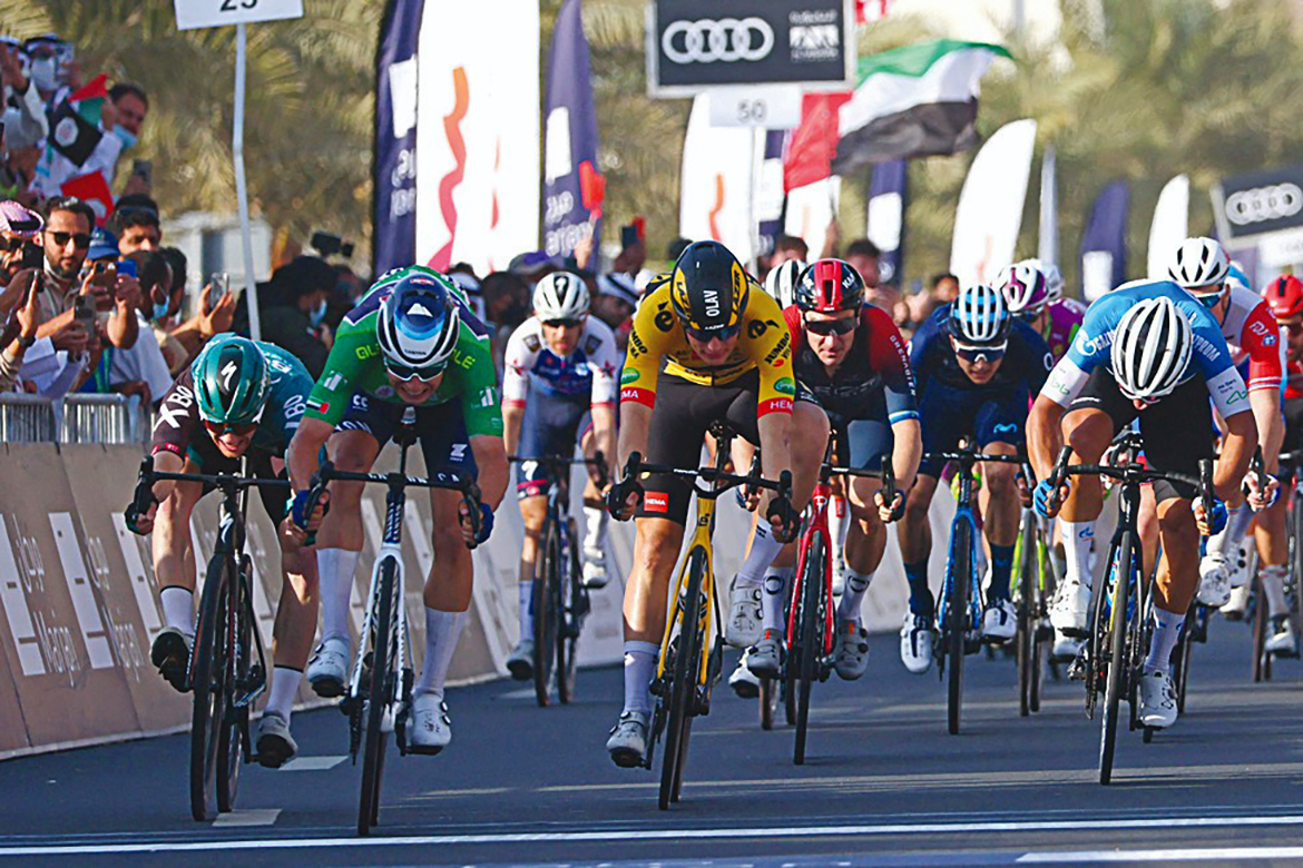 AL MARJAN ISLAND: Alpecin-Fenix's cyclist Jasper Philipsen (2nd- left) crosses the finish line to win stage 5 of the United Arab Emirates cycling tour, from Ras Al-Khaimah Corniche to Al-Marjan Island yesterday. - AFP