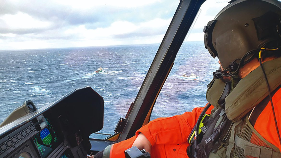 AT SEA: This undated Royal Canadian Air Force photo obtained from the Joint Rescue Co-ordination Centre in Halifax, shows a helicopter crew and vessels of opportunity searching the ocean for survivor of a Spanish fishing trawler which sank off eastern Canada. – AFP