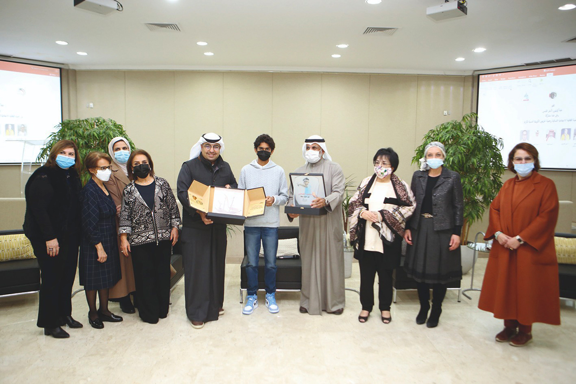 KUWAIT: Kuwaiti tennis player Mohammed Al-Awadhi (center) is honored during the event. - Photos by Yasser Al-Zayyat