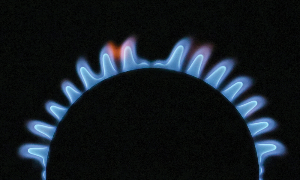 BRIGHTON, UK: A photo illustration shows gas burning on a domestic hob in Brighton, southern England on Wednesday. —AFP