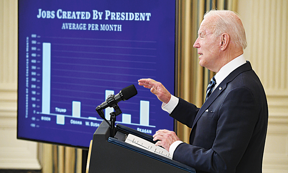 WASHINGTON: US President Joe Biden speaks about the January jobs report from the State Dining Room of the White House in Washington, DC, on Friday. —AFP