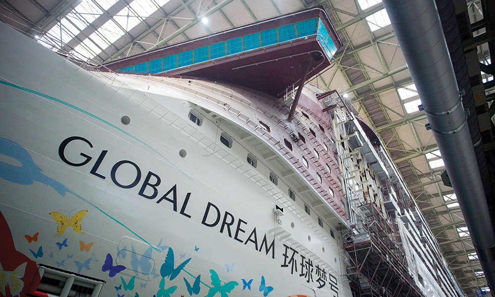 WISMAR, Germany: The 342m long and almost finished cruise ship “Global Dream“ is pictured in the main assembly hall of the shipbuilder “MV Werften” in Wismar. —AFP