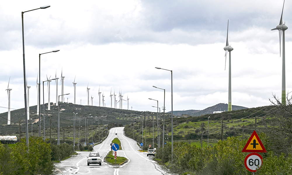AGII APOSTOLI, Greece: A photograph shows wind turbines alongside the provincial road of Evia island near Agii Apostoli. — AFP