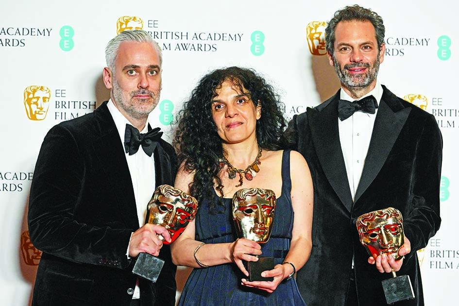 British producer Iain Canning, British producer Tanya Seghatchian and Autralian producer Emile Sherman pose with their awards for Best Film for ‘The Power of the Dog’ shared with New Zealand director Jane Campion and Canadian director Roger Frappier (not pictured) at the BAFTA British Academy Film Awards at the Royal Albert Hall in London.—AFP photos n