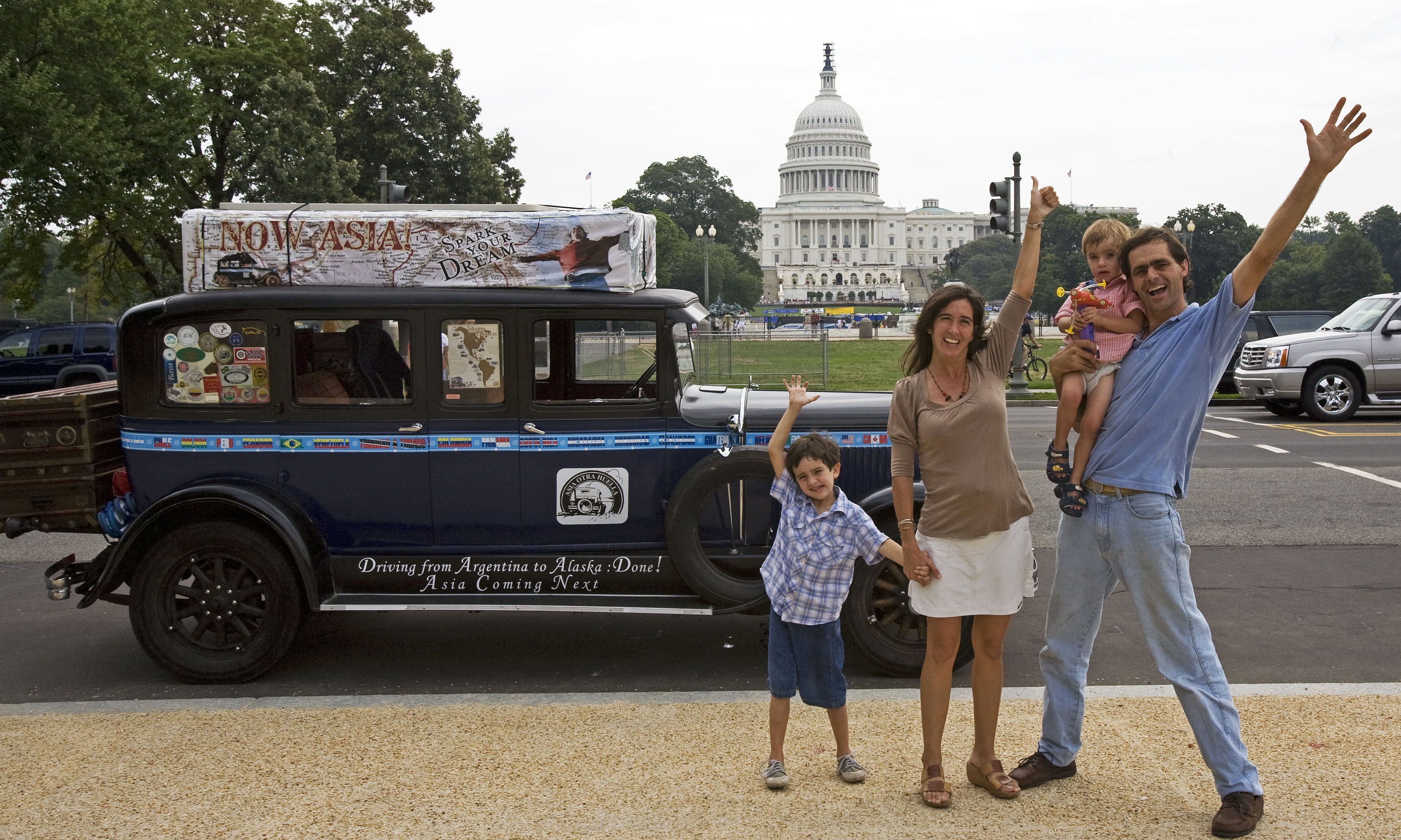 This file photo taken on July 19, 2007 shows Candelaria (second left) and Herman Zapp (right), and their children Pampa (left) and Tehue (second right), standing next to their 1928 Graham-Page automobile near the US Capitol in Washington DC. –AFP photosn