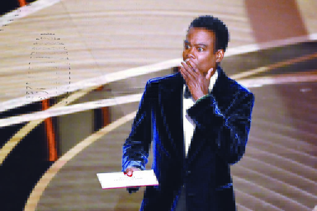 US actor Chris Rock speaks onstage during the 94th Oscars at the Dolby Theatre in Hollywood, California.-AFP