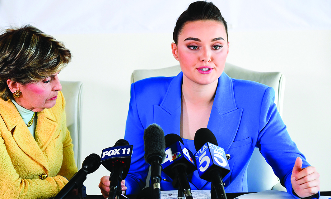 Veronika Didusenko (right), who was crowned Miss Ukraine in 2018, speaks alongside women’s rights attorney Gloria Allred (left) during a press conference about her experience fleeing the war in Ukraine in Los Angeles, California. –AFP nn