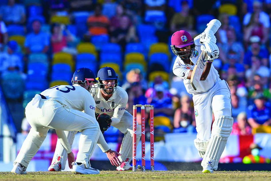 BRIDGETOWN, Barbados: Kraigg Brathwaite (R) of West Indies hits 4 and Ben Foakes (2nd L) of England watches during the 2nd Test between West Indies and England at Kensington Oval, Bridgetown, Barbados. – AFPnn