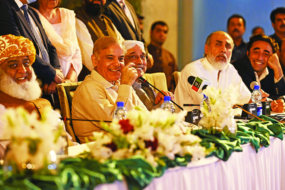 ISLAMABAD: Pakistan's opposition parties leaders Shahbaz Sharif (2L), Asif Ali Zardari (C), Fazlur Rehman (L) and Bilawal Bhutto Zardari (R) speak during a press conference in Islamabad on March 28, 2022. – AFP