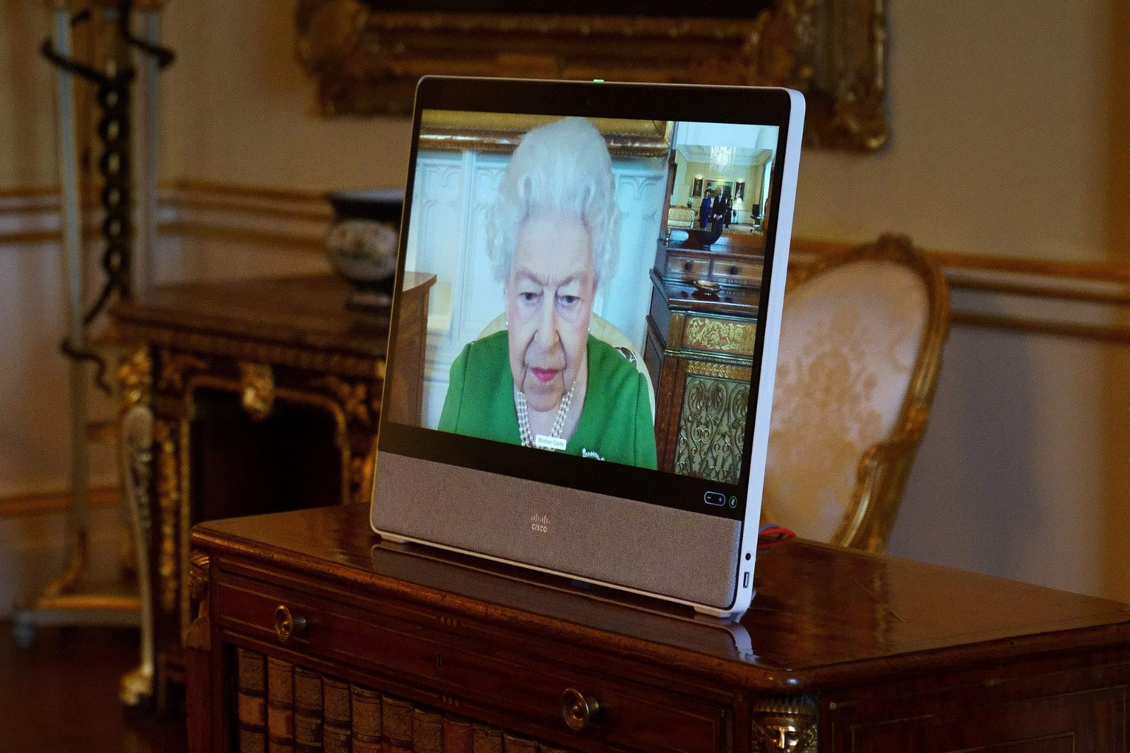 LONDON: Britain's Queen Elizabeth II appears on a screen via videolink from Windsor Castle, during a virtual audience to receive the Andorra's ambassador to the United Kingdom. - AFP