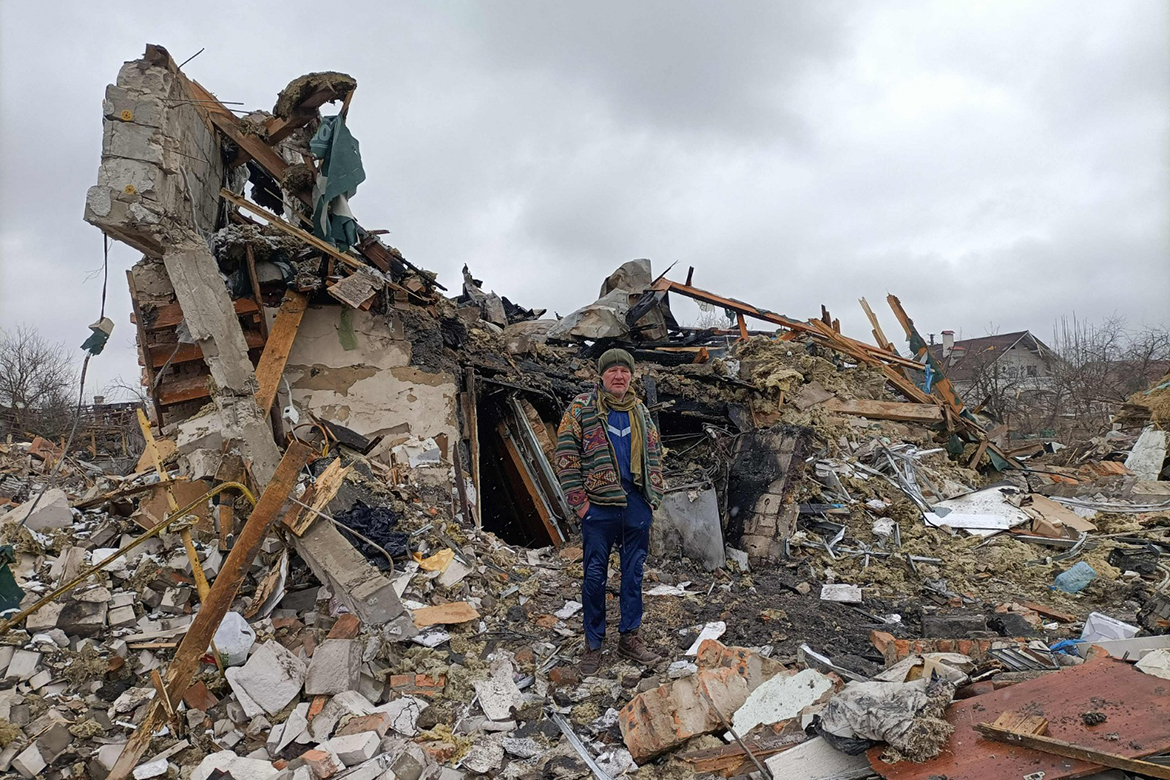 ZHYTOMYR: A Ukrainian man stands in the rubble in Zhytomyr, following a Russian bombing the day before. - AFP