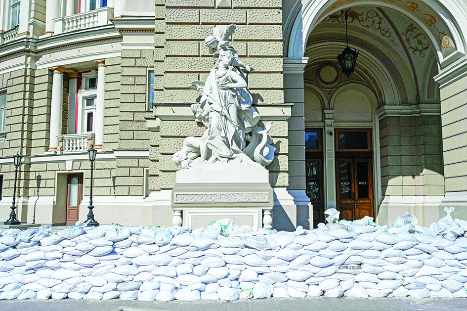 A barricade is pictured in front of the National Academic Theater of Opera and Ballet in Odessa.- AFP photosn