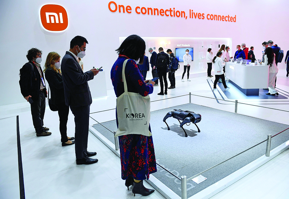 Visitors look at the Cyberdog robot on Xiaomi’s stand on the opening day of the MWC (Mobile World Congress) in Barcelona. The world’s biggest mobile fair was held from February 28 to March 3, 2022. – AFP photosn