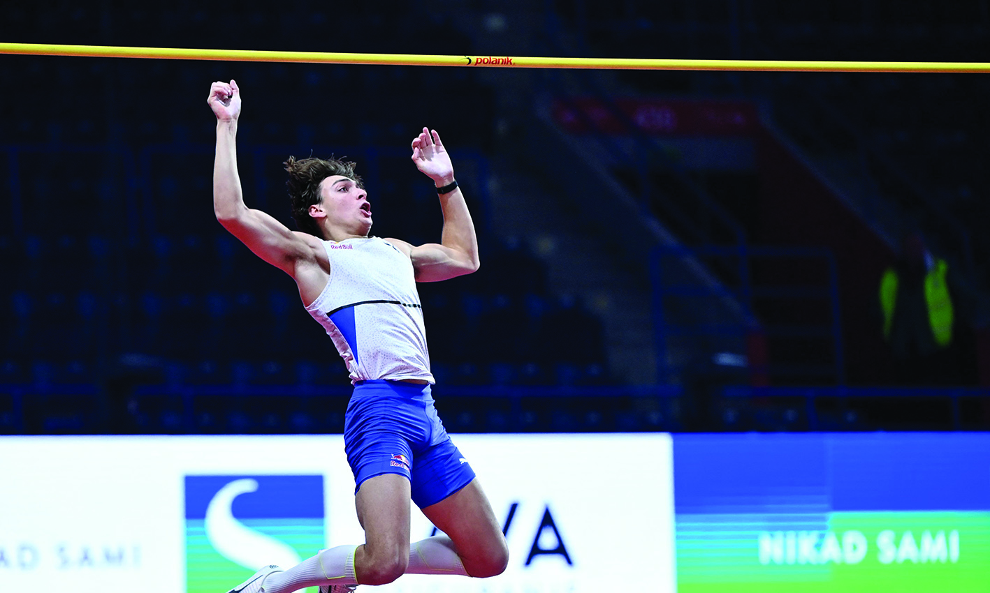BELGRADE: Sweden's Armand Duplantis clears a pole and breaks his own pole vaulting world record at the World Athletics Indoor Tour Silver meeting in Belgrade on March 7, 2022. - AFPn
