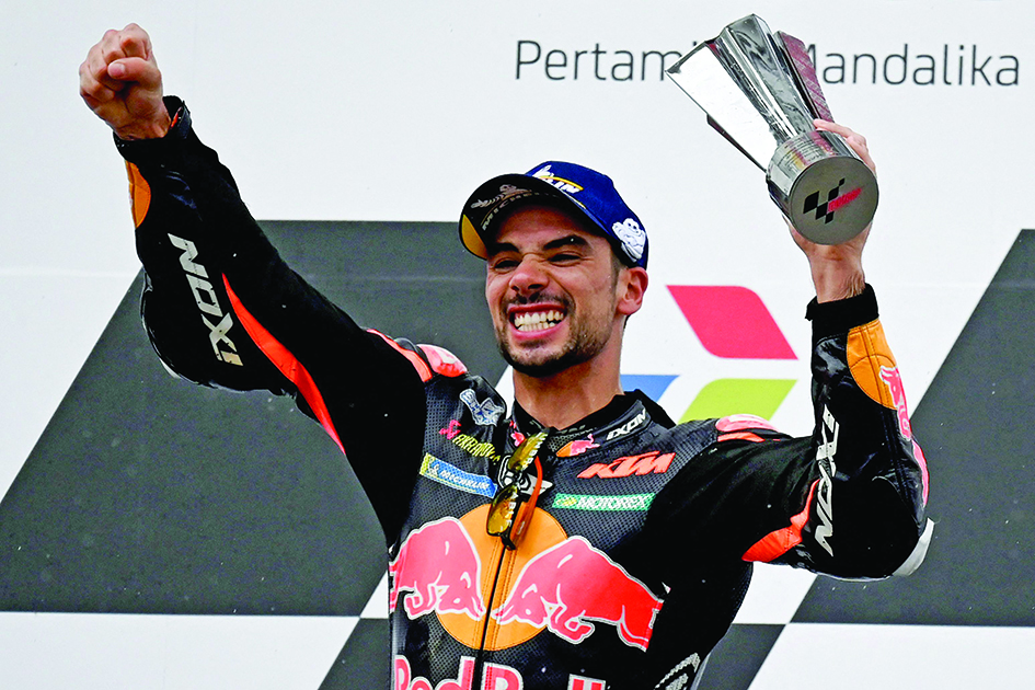 KUTA MANDALIKA: First-placed Red Bull KTM Factory Racing’s Portuguese rider Miguel Oliveira celebrates after winning the Indonesian Grand Prix MotoGP race yesterday.- AFPn