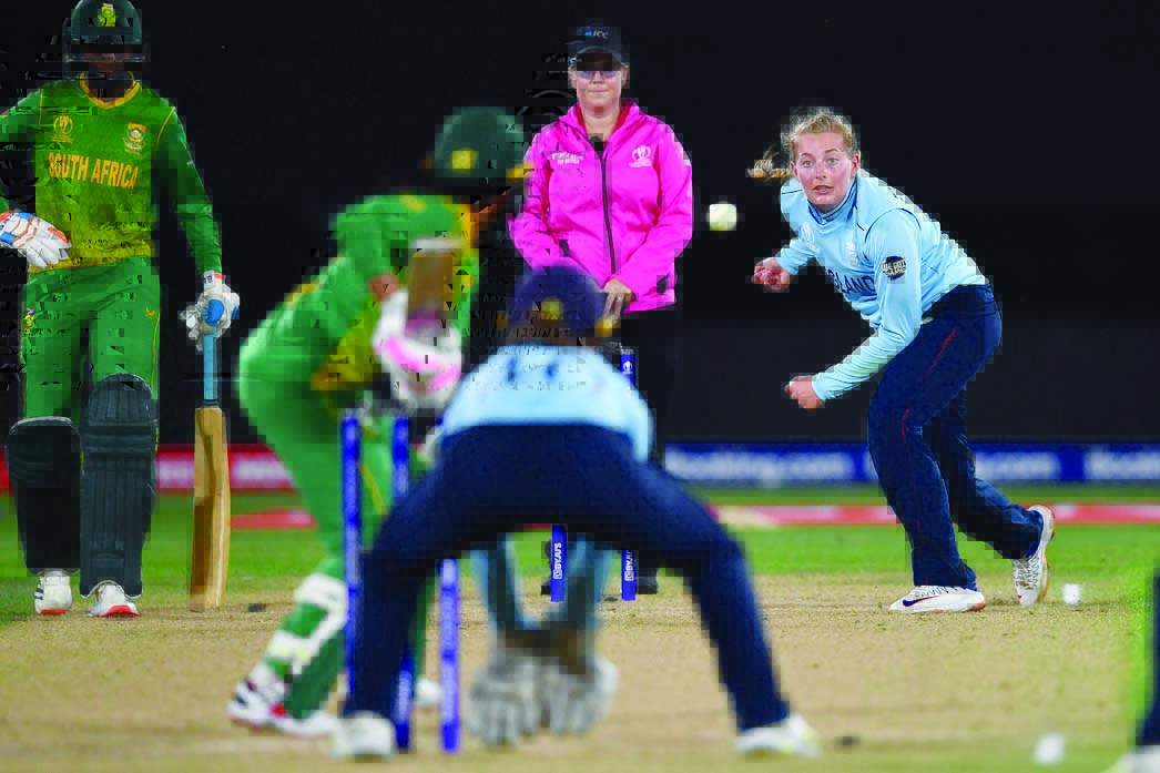 CHRISTCHURCH: England's Sophie Ecclestone bowls to South Africa's Trisha Chetty during their 2022 Women's Cricket World Cup second semifinal at Haley Oval on March 31, 2022. - AFP