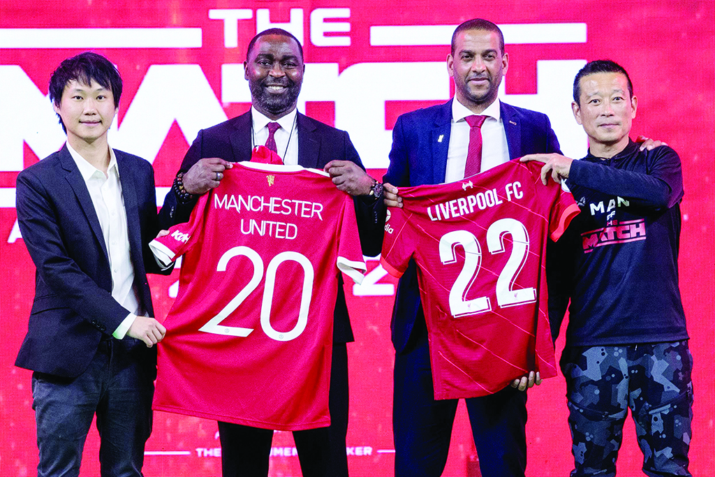 BANGKOK: (From left) CEO of Bitkub Jirayut Srupsrisopa, former football player Andy Cole, former football player Phil Babb and CEO of Fresh Air Festival Vinij Lertratanachai pose during a press conference on March 31, 2022. - AFP 
