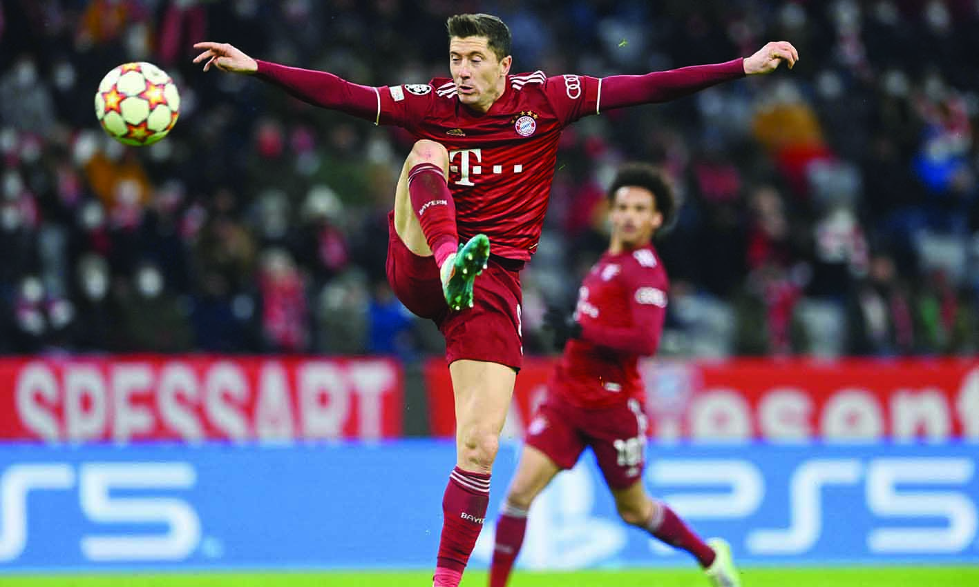 MUNICH: Bayern Munich's Polish forward Robert Lewandowski controls the ball during the UEFA Champions League last-16, second-leg match against Salzburg on Tuesday. - AFP  n