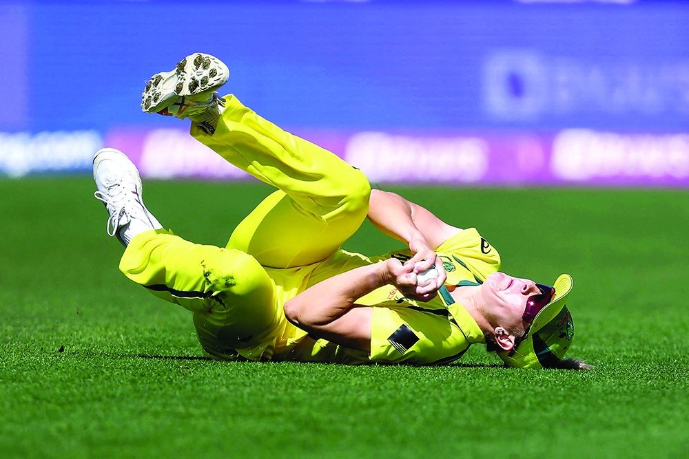 WELLINGTON: Australia's Annabel Sutherland takes a successful catch to dismiss West Indies' Aaliyah Alleyne during the 2022 Women's Cricket World Cup match between the West Indies and Australia yesterday.- AFPn