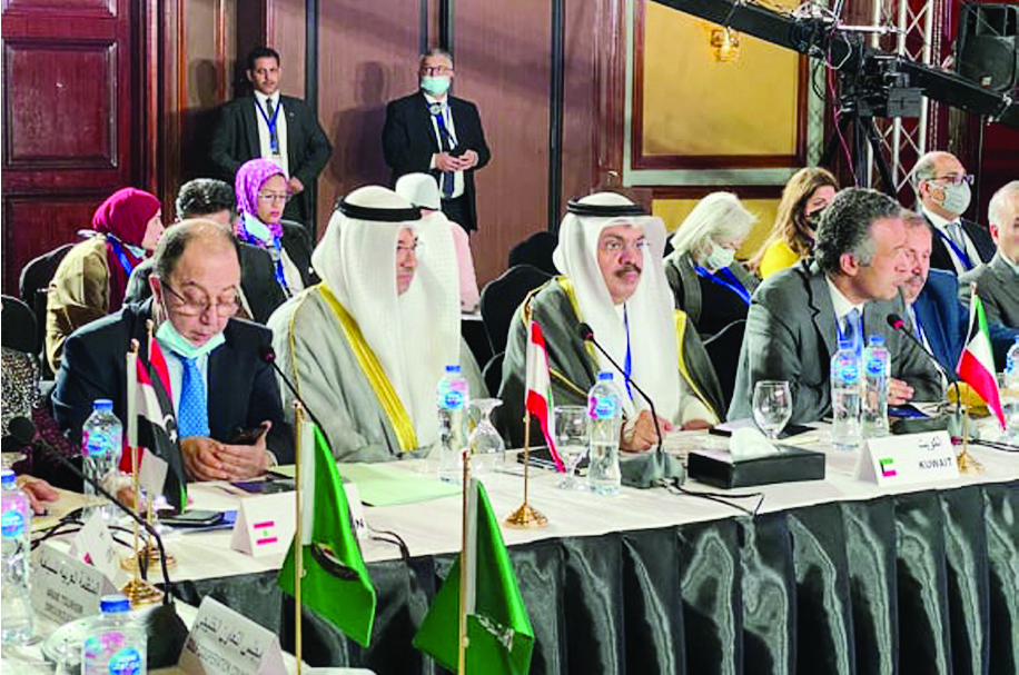 CAIRO: Undersecretary of Kuwait's Ministry of Information Saleh Al-Otaibi is pictured with other official during the summit in Cairo.- KUNA