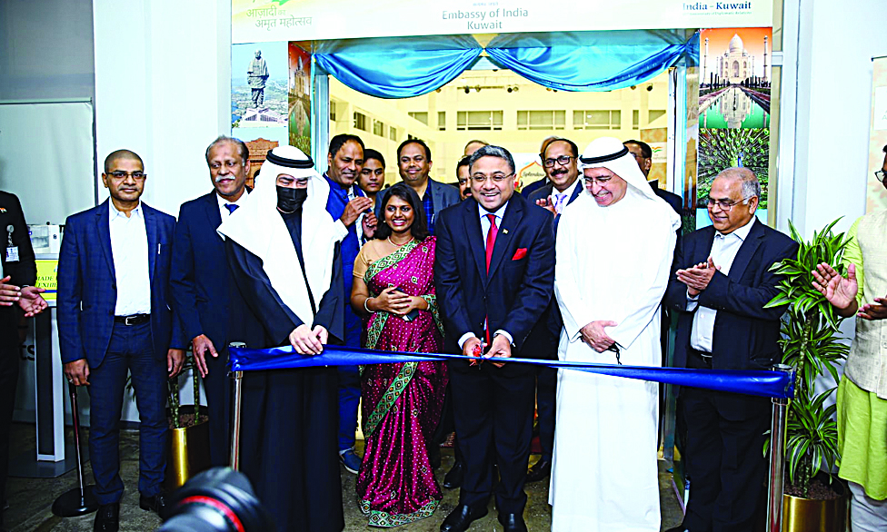 KUWAIT: Indian Ambassador Sibi George cuts the ribbon to officially inaugurate the day-long festival in the presence of Kamel Abdul Jalil and Ahmad Bastaki.n