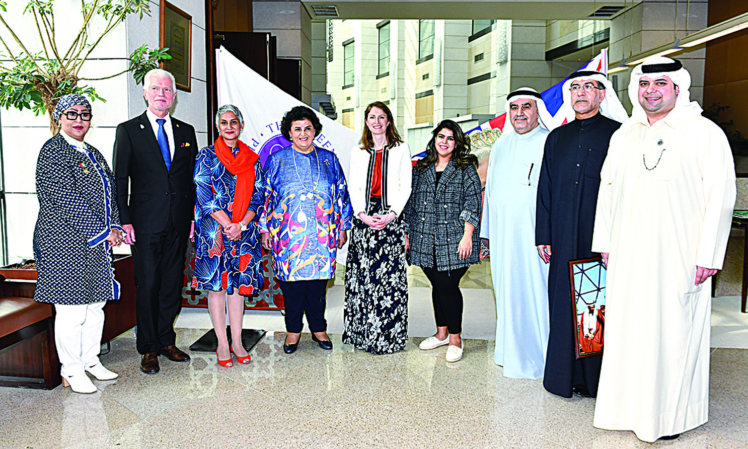 KUWAIT: A group photo taken following the inauguration of the exhibition yesterday. - KUNA photosn