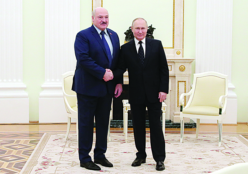 MOSCOW: Russian President Vladimir Putin meets with his Belarus' counterpart Alexander Lukashenko at the Kremlin in Moscow on March 11, 2022. - AFPnnn