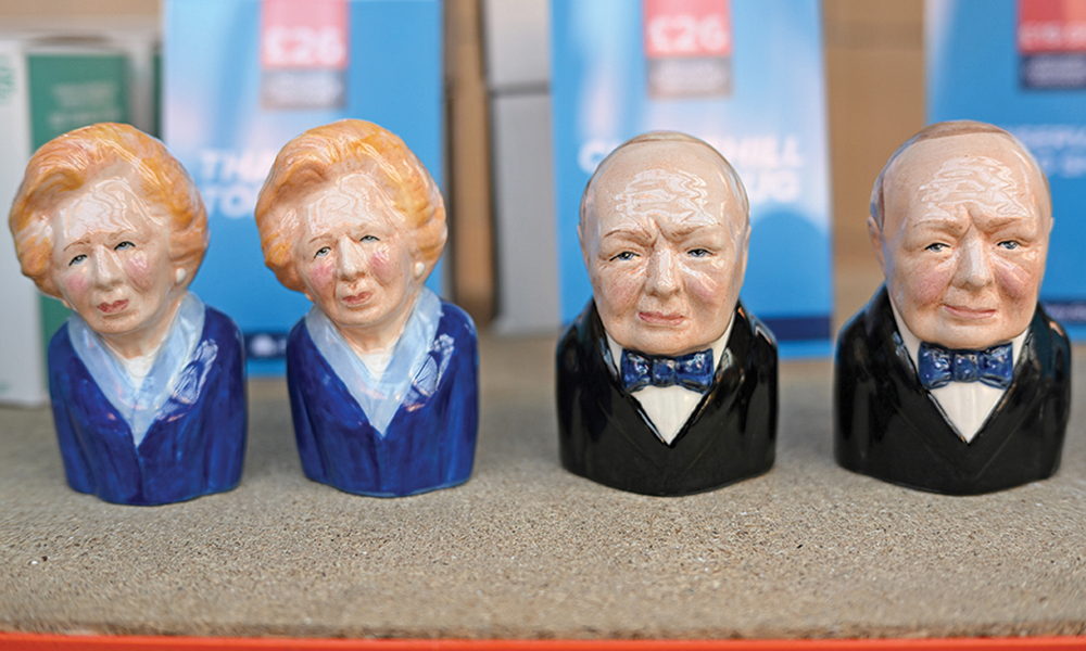 BLACKPOOL, UK: Commemorative souvenir mugs featuring depictions of former Conservative Prime Ministers Margaret Thatcher (left) and Winston Churchill are pictured for sale at the Conservative Party Spring Conference, at Blackpool Winter Gardens in Blackpool, north-west England on Friday. — AFP
