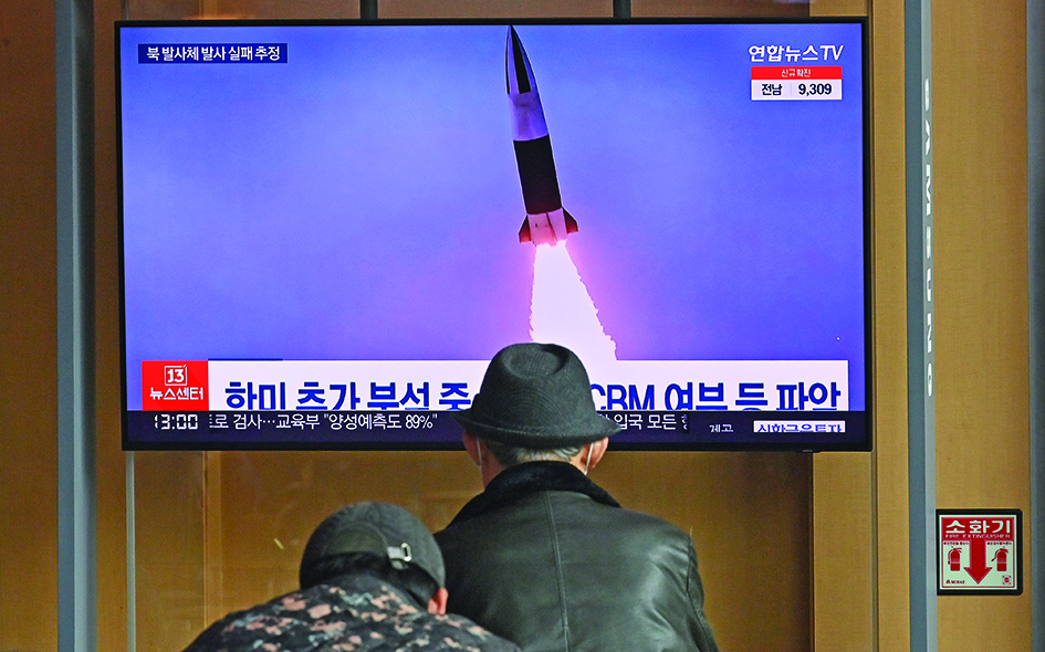 SEOUL, South Korea:  People watch a television screen showing a news broadcast with file footage of a North Korean missile test, at a railway station in Seoul yesterday after North Korea fired an “unidentified projectile” but appeared to have immediately failed according to the South’s military. – AFPnn