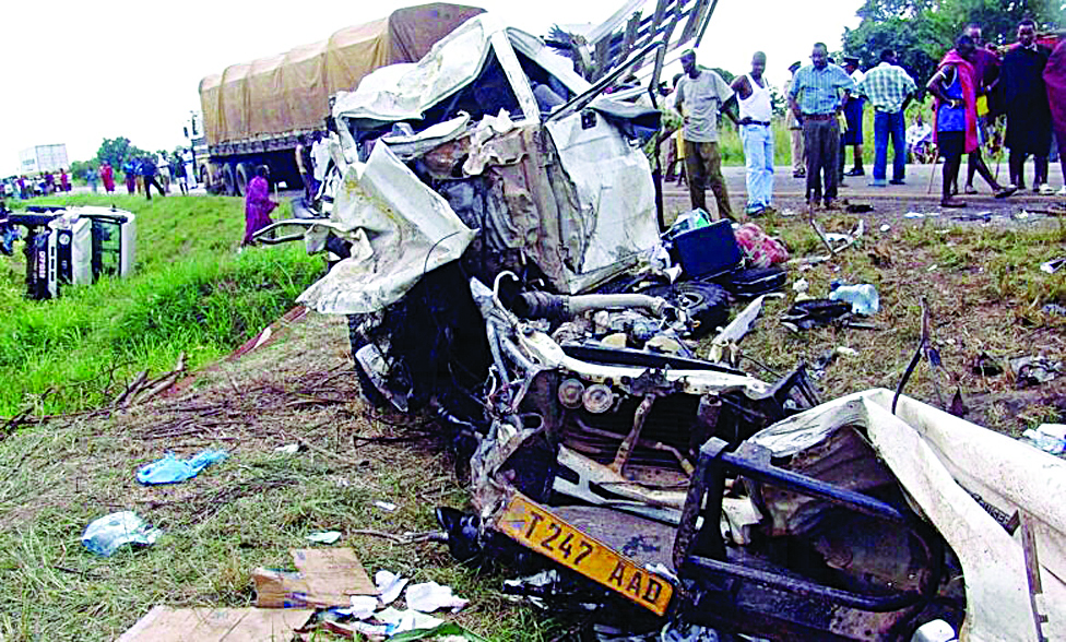 DAR ES SALAAM, Tanzania: The site of the lorry-bus collision in which 23 people have died near Dar es Salaam on Fridayn