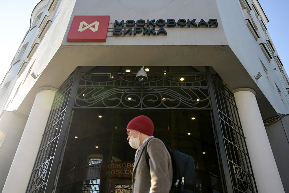 MOSCOW: A man walks past the Moscow's stock market building in downtown Moscow. - AFPnn