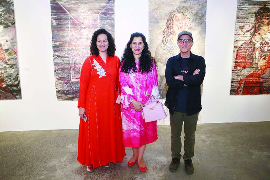 Photo shows Sheikha Intisar Salem Al-Ali posing with her daughter and Iranian artist Reza Doust during his exhibition “Forty-Three Narrative Portraits” at Den Gallery at Crystal tower in Kuwait city.—Photos by Yasser Al-Zayyat