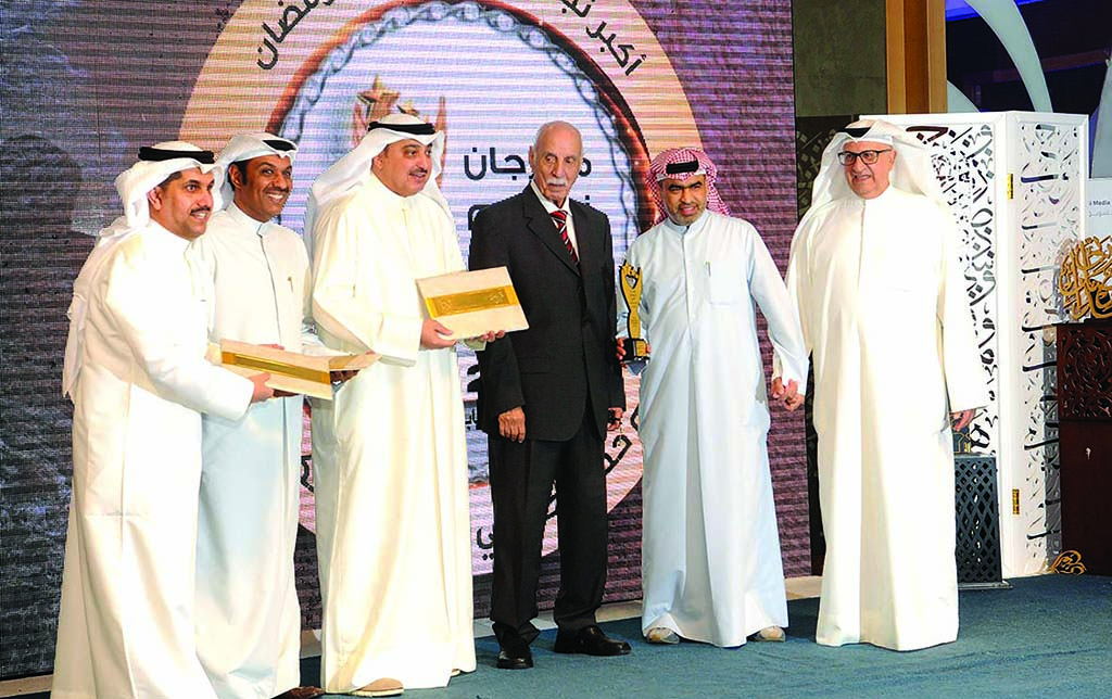 Mohammad Al-Sanousi with media figures who were honored during the event.