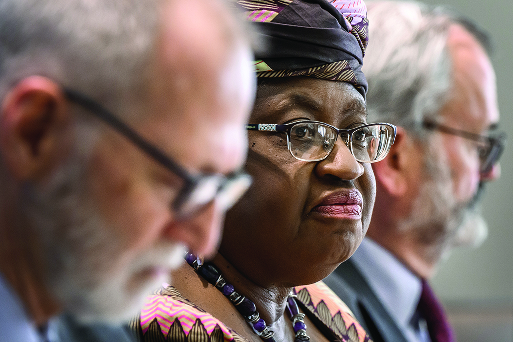 GENEVA: World Trade Organization (WTO) director-general Ngozi Okonjo-Iweala (center) looks on between WTO chief economist Robert Koopman (left) and WTO spokesman Keith Rockwell during a press conference on WTO trade forecast at the intergovernmental trade organization in Geneva on April 12, 2022. - AFP