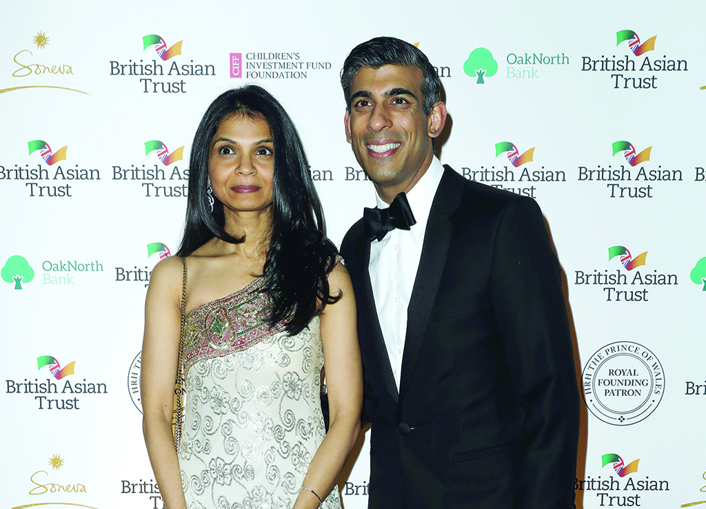 LONDON: File photo shows, Britain's Chancellor of the Exchequer Rishi Sunak (R) poses with his wife Akshata Murty during a reception to celebrate the British Asian Trust at The British Museum in London. - AFP