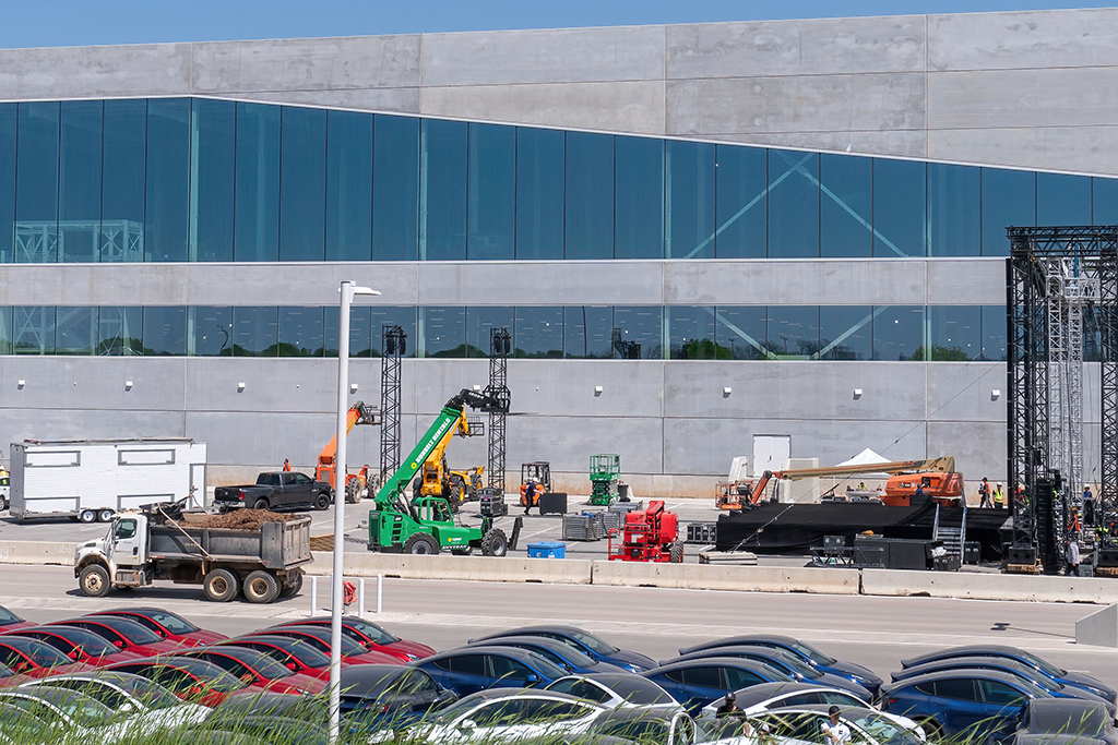 AUSTIN: Workers set up for the grand opening party at the new Tesla Giga Texas manufacturing facility on April 6, 2022 in Austin, Texas. - AFP