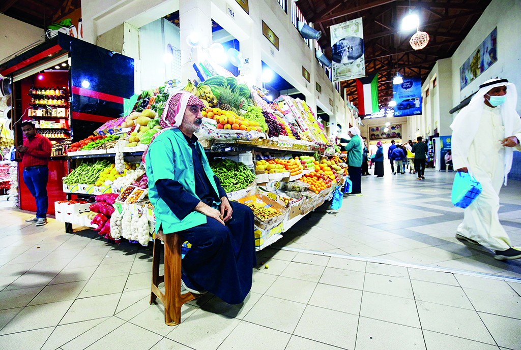 KUWAIT: A vendor waits for customers at a market during the holy month of Ramadan in downtown Kuwait City. For Muslims across the world, the beginning of the ninth month in the Muslim lunar calendar which marks the start of Ramadan is a time for spiritual reflection, prayers and fasting. During Ramadan practicing Muslims do not eat, drink, smoke or have sex between sunrise and sunset.-  Photo by Yasser Al-Zayyat