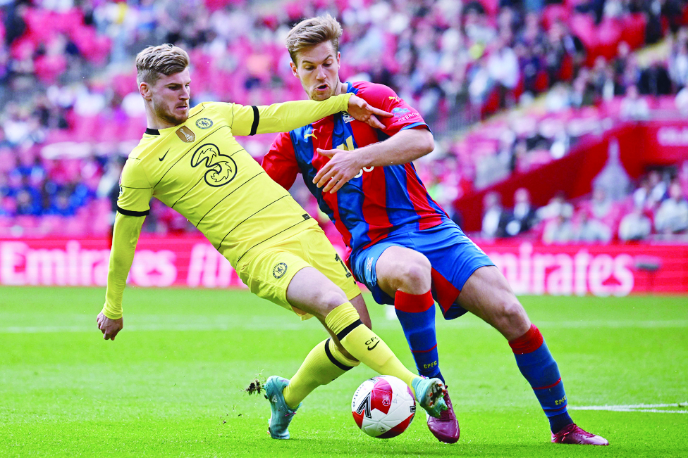 LONDON: Chelsea's German striker Timo Werner fights for the ball with Crystal Palace's Danish defender Joachim Andersen during their English FA Cup semifinal match at Wembley Stadium on April 17, 2022. - AFP